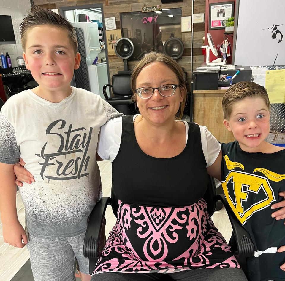 Marissa Bowman, with sons Charlie and Carson, are clients at Lighthouse Outreach Center in Bartlesville.