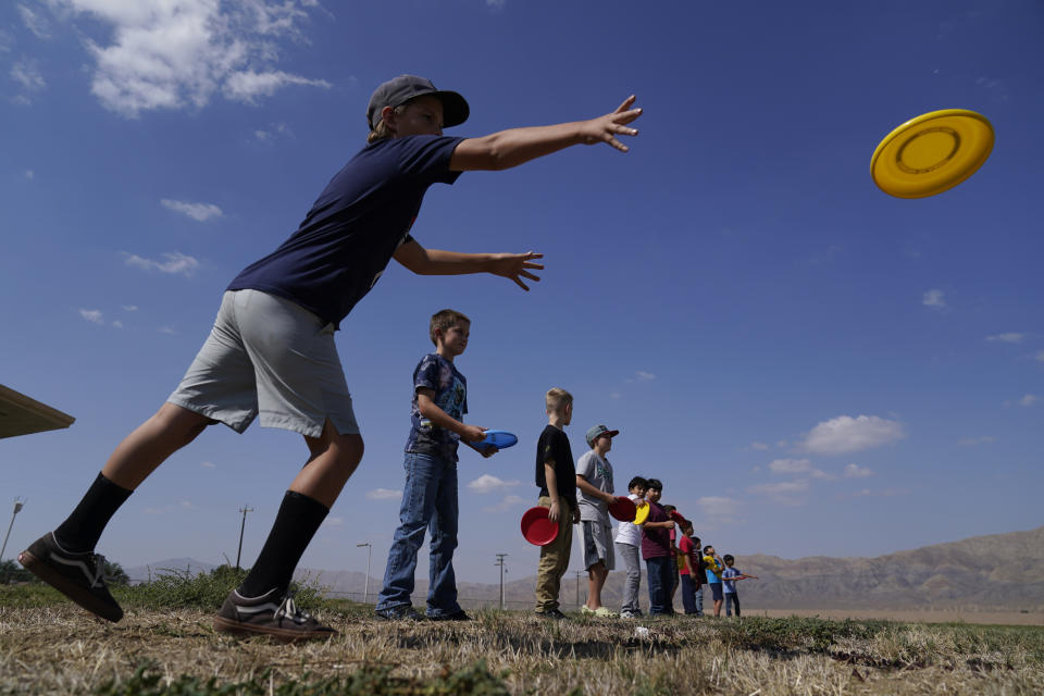 Children participate in a physical education class inside Cuyama Elementary School, Wednesday, Sept. 20, 2023, in New Cuyama, Calif. (AP Photo/Marcio Jose Sanchez)