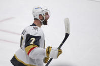 Vegas Golden Knights defenseman Alex Pietrangelo celebrates his overtime goal on Minnesota Wild goaltender Cam Talbot during an NHL hockey game Wednesday, May 5, 2021, in St. Paul, Minn. The Golden Knights won 3-2. (AP Photo/Andy Clayton-King)