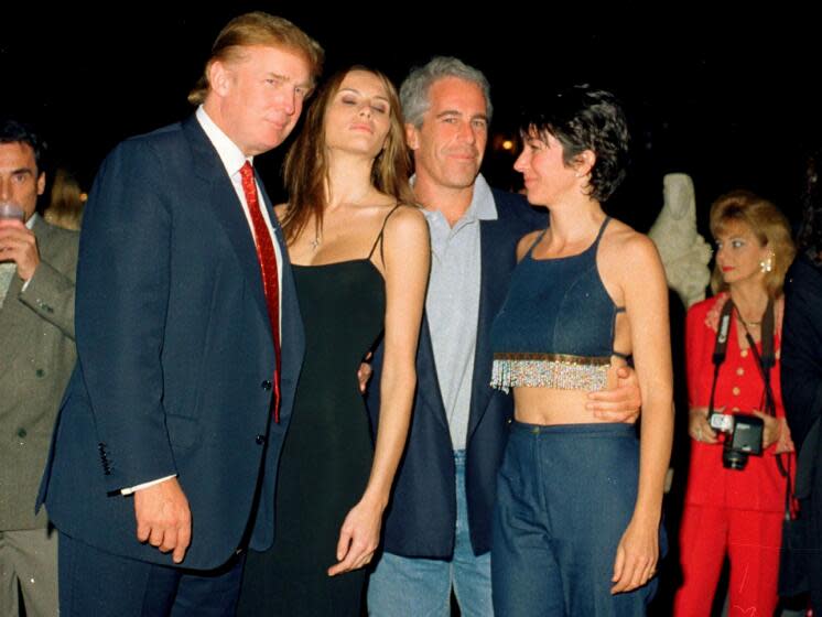 From left, American real estate developer Donald Trump and his girlfriend (and future wife), former model Melania Knauss, financier (and future convicted sex offender) Jeffrey Epstein, and British socialite Ghislaine Maxwell pose together at the Mar-a-Lago club, Palm Beach, Florida, February 12, 2000. (Photo by Davidoff Studios/Getty Images)