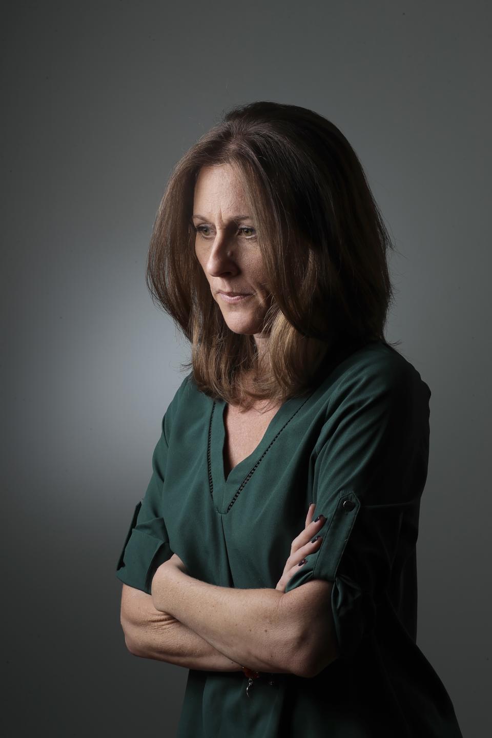 Kim Goldman poses for a portrait Friday, June 7, 2019, in Los Angeles. Goldman has continued to make the case publicly that it was O.J. Simpson who killed her brother and Simpson's ex-wife on a June night in 1994. Beginning Wednesday, Goldman will examine the case in a 10-episode podcast, "Confronting: OJ Simpson." She'll interview her brother's old friends, the police detective who investigated the killings, attorneys for the defense and prosecution, and two of the 12 jurors who voted to acquit Simpson. (AP Photo/Marcio Jose Sanchez)