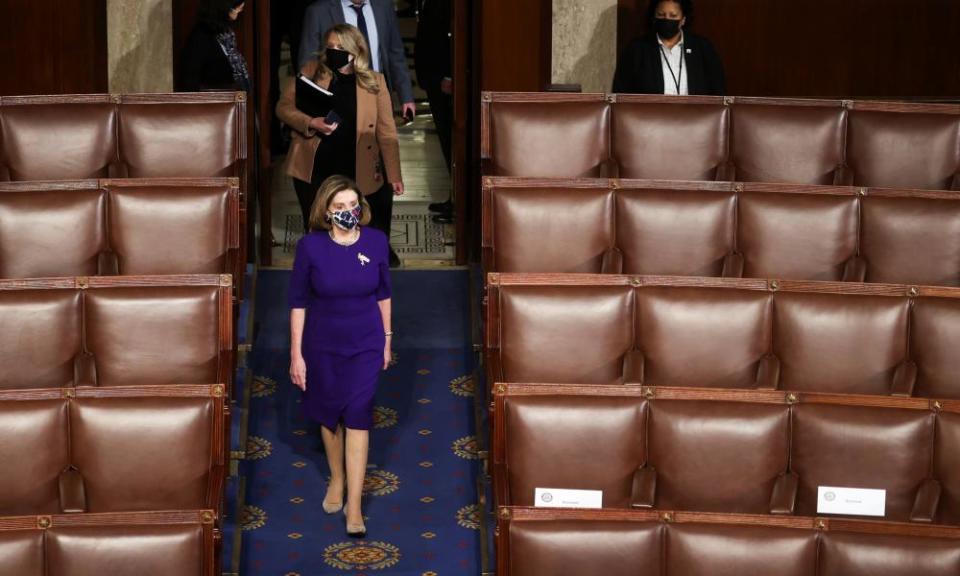 Pelosi arrives at the House chamber for a joint session to certify the 2020 election results on 6 January 2021.