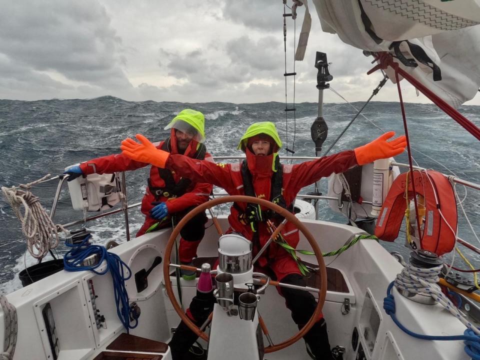 Jill Colmber at the helm in the Southern Ocean alongside sailor Christian Ferree aboard the Explorer. 