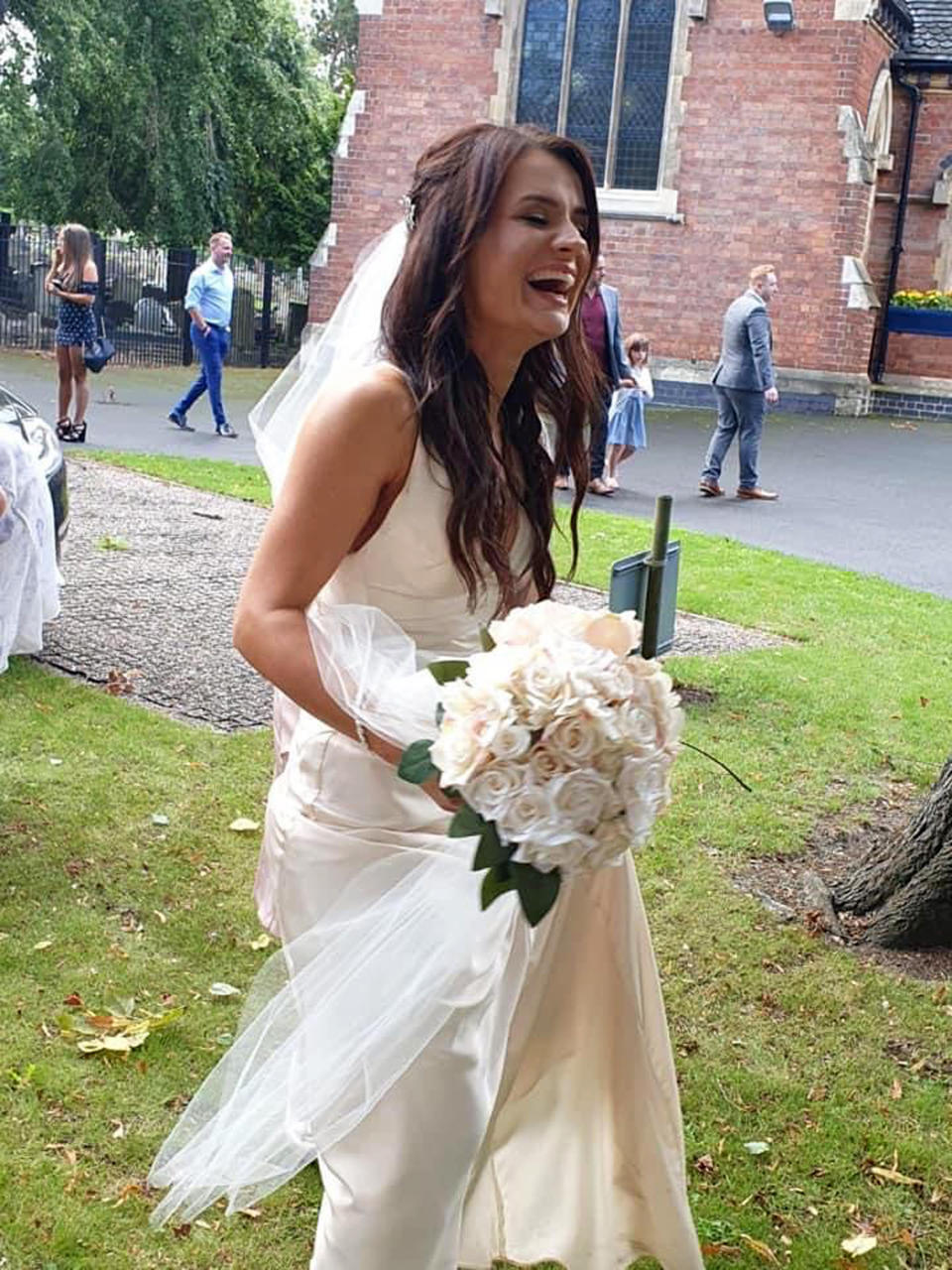 The bride bought her dress on ASOS and made her bouquet. (Caters)