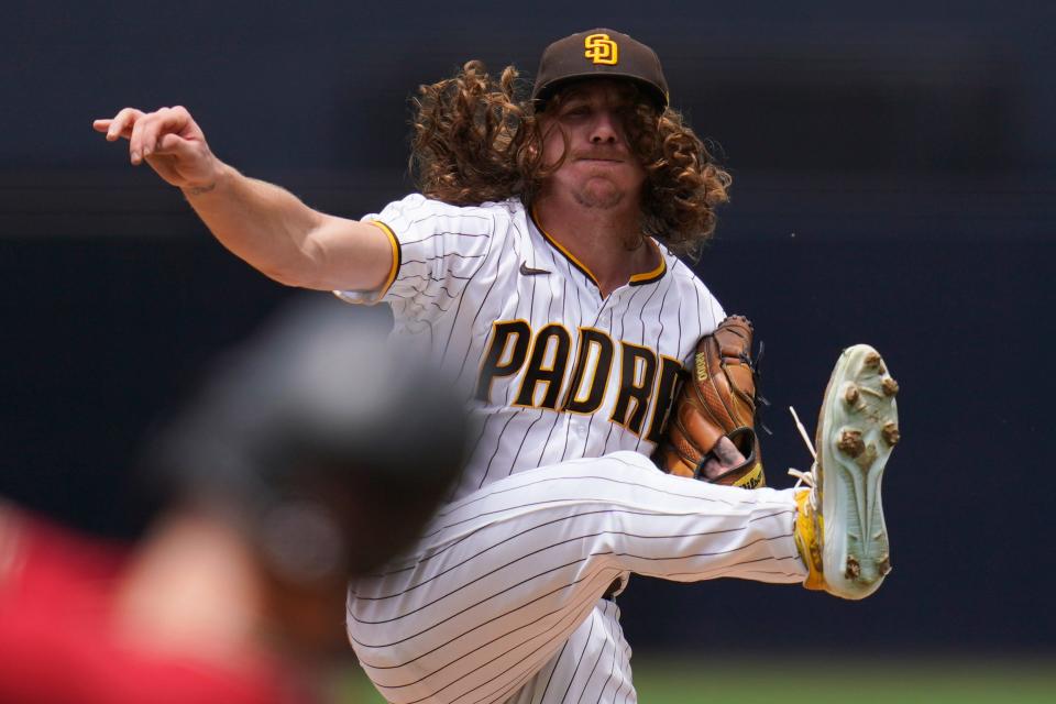San Diego Padres starting pitcher Mike Clevinger works against an Arizona Diamondbacks batter during the first inning of a baseball game Wednesday, June 22, 2022, in San Diego. (AP Photo/Gregory Bull)
