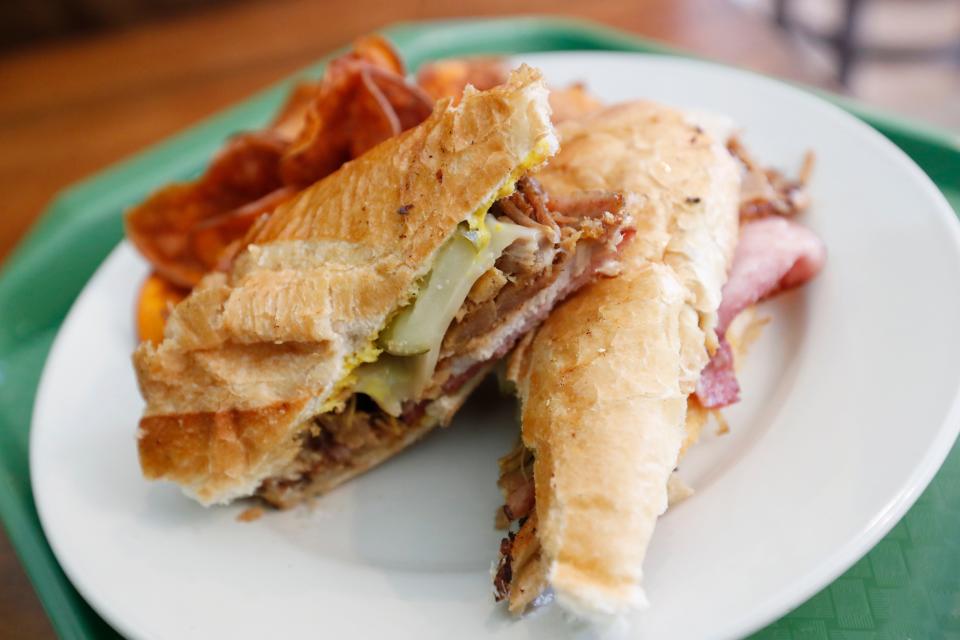 The Cuban sandwich with fresh made sweet potato chips at Preacher Green's on Barnett Shoals Road in Athens, Ga., on Friday, April 5, 2024. The restaurant opened this week and offers a verity of sandwiches and salads for lunch and classic southern meat and three style dinner options.