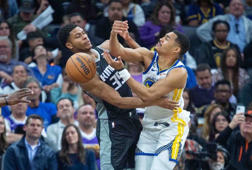 Sacramento Kings guard PJ Dozier (35) fights for the ball against Golden State Warriors guard Jordan Poole (3) During an NBA game between on Friday, April, 7, 2023 at Golden 1 Center.