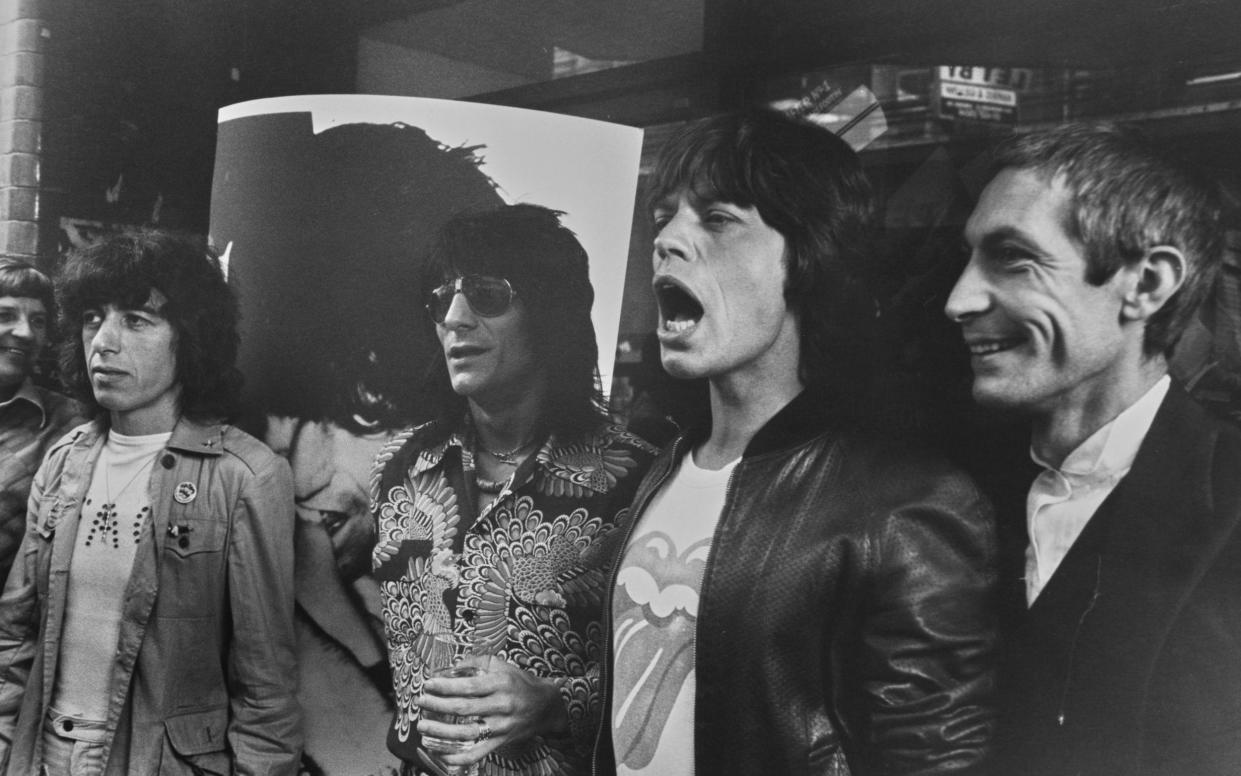 Bill Wyman, Ronnie Wood, Mick Jagger and Charlie Watts outside the Marquee Club in 1977 - Paul Popper/Popperfoto/Getty