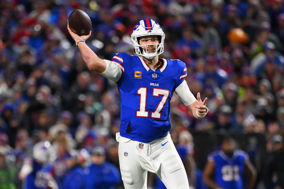 ORCHARD PARK, NEW YORK - DECEMBER 17: Josh Allen #17 of the Buffalo Bills attempts a pass during the first half against the Dallas Cowboys at Highmark Stadium on December 17, 2023 in Orchard Park, New York. (Photo by Rich Barnes/Getty Images)