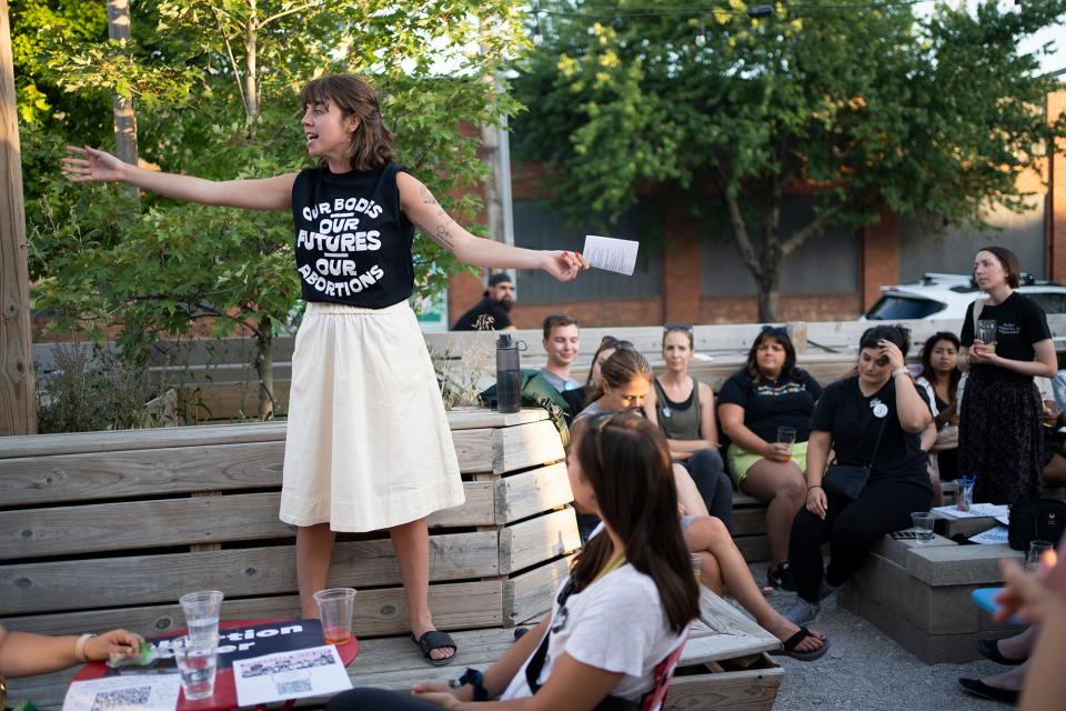 Sierra Dobbs-Brown, with Planned Parenthood Advocates of Ohio, addresses the crowd during a community care event held by abortion rights groups, to offer a space for healing and planning after the Supreme Court struck down Roe v. Wade.