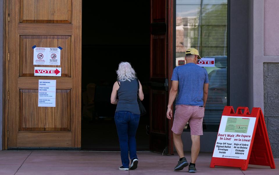 Voters arrive to the polling place inside the Islamic Center in Scottsdale on Aug. 2, 2022.