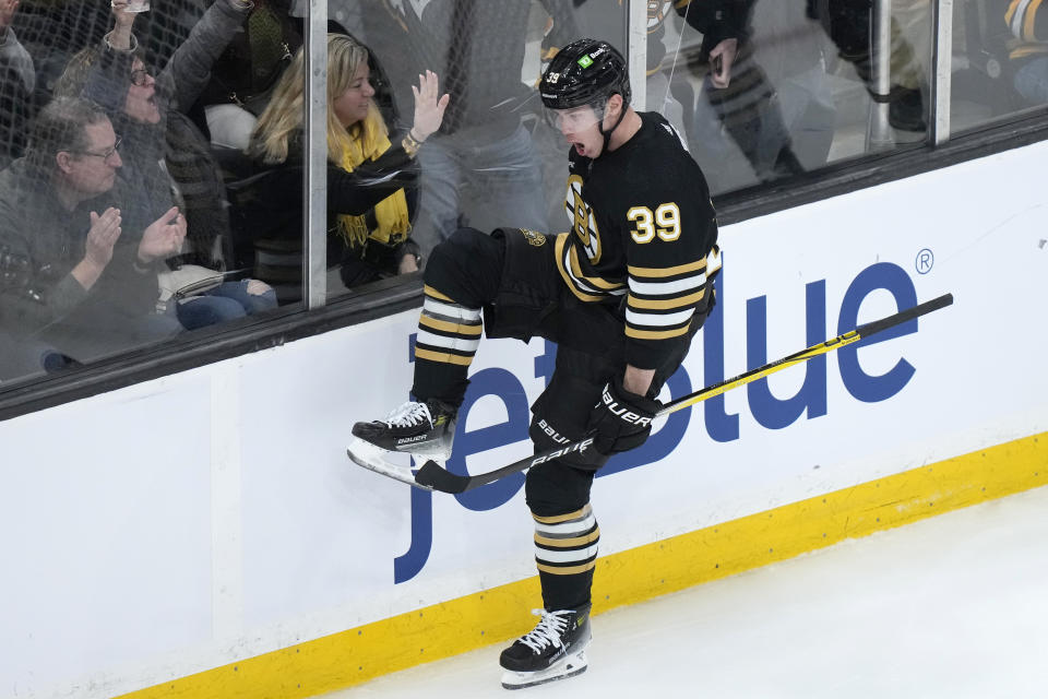 Boston Bruins center Morgan Geekie (39) celebrates after scoring in the second period of an NHL hockey game against the Pittsburgh Penguins, Thursday, Jan. 4, 2024, in Boston. (AP Photo/Steven Senne)