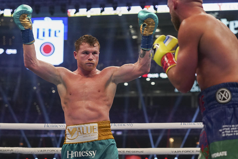 Canelo Alvarez reacts during a unified super middleweight world championship boxing match against Billy Joe Saunders, Saturday, May 8, 2021, in Arlington, Texas. (AP Photo/Jeffrey McWhorter)