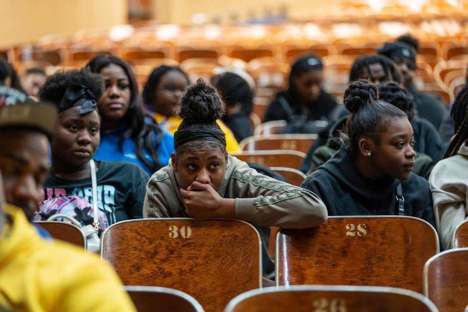 Pershing High School students listen as rival gang members from the 4s and 5s unite to preach peace and an end to violence in the aftermath of the killing of 11-year-old Latrelle Mines in early January during an assembly at Pershing High School on Thursday, Feb. 1, 2023. Members of Ceasefire, Black Family Development and Detroit Friends and Family also spoke during the historic first time the rival gangs have been under the same roof promoting peace.