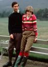 <p>Ahead of their royal wedding, Princess Diana posed for a photo with Prince Charles at Balmoral wearing a pink patterned pullover with trousers and boots.</p>