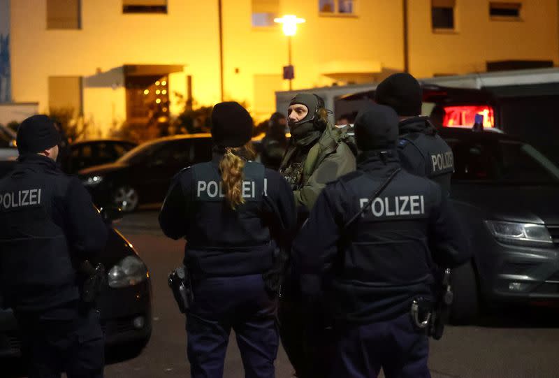 German special forces prepare to search an area after a shooting in Hanau near Frankfurt