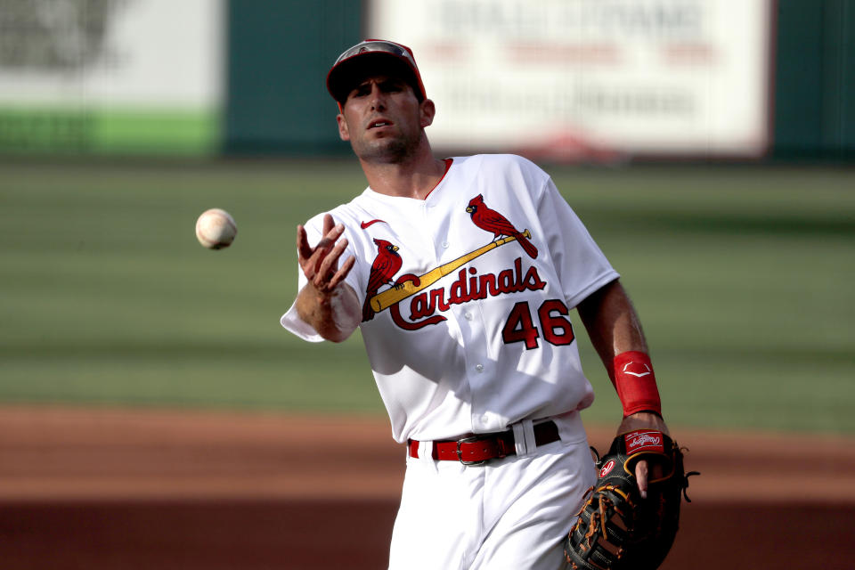 St. Louis Cardinals infielder Paul Goldschmidt tosses a ball toward the dugout during an intrasquad practice baseball game at Busch Stadium Thursday, July 9, 2020, in St. Louis. (AP Photo/Jeff Roberson)