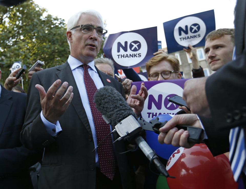 Alistair Darling, the leader of the campaign to keep Scotland part of the United Kingdom, campaigns in Edinburgh, Scotland September 8, 2014. The British pound slid and the stock market shuddered on Monday after an opinion poll showed that Scots may vote for independence next week in a referendum that could herald the break up of the United Kingdom. The referendum on Scottish independence will take place on September 18, when Scotland will vote whether or not to end the 307-year-old union with the rest of the United Kingdom. REUTERS/Russell Cheyne (BRITAIN - Tags: POLITICS ELECTIONS BUSINESS)