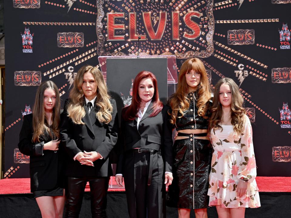 Harper Vivienne Ann Lockwood, Lisa Marie Presley, Priscilla Presley, Riley Keough, and Finley Aaron Love Lockwood attend the Handprint Ceremony honoring Three Generations of Presley's at TCL Chinese Theatre on June 21, 2022.