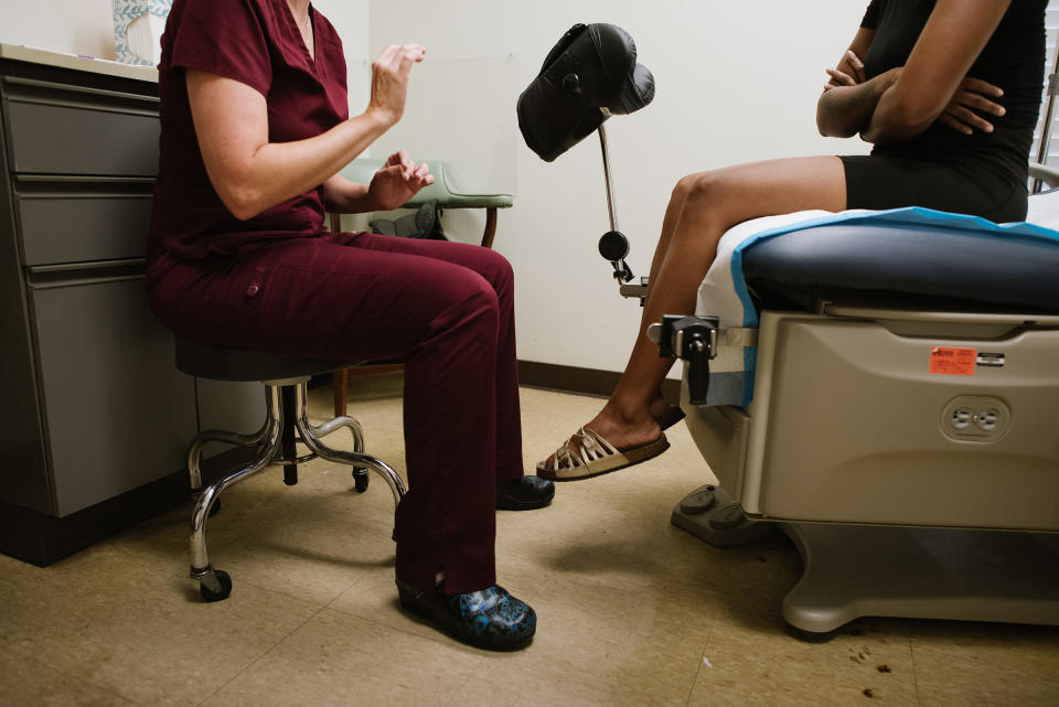 Dr. Leah Torres meets with a patient receiving an IUD on July 21.<span class="copyright">Lucy Garrett for TIME</span>