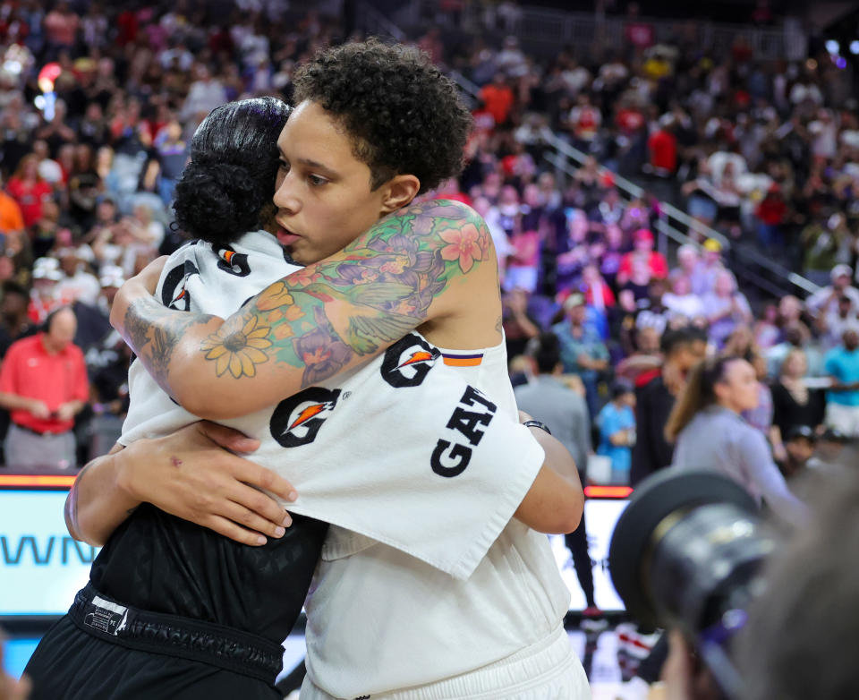 The Aces' A'ja Wilson and the Mercury's Brittney Griner hug on the court after the teams' regular-season finale on Sept. 10, 2023, in Las Vegas. (Photo by Ethan Miller/Getty Images)