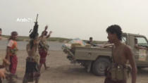 Armed members of Arab-backed Yemeni forces are seen near the airport on the outskirts of Hodeidah, Yemen, June 20, 2018 in this still image taken from video. ARAB 24 via REUTERS