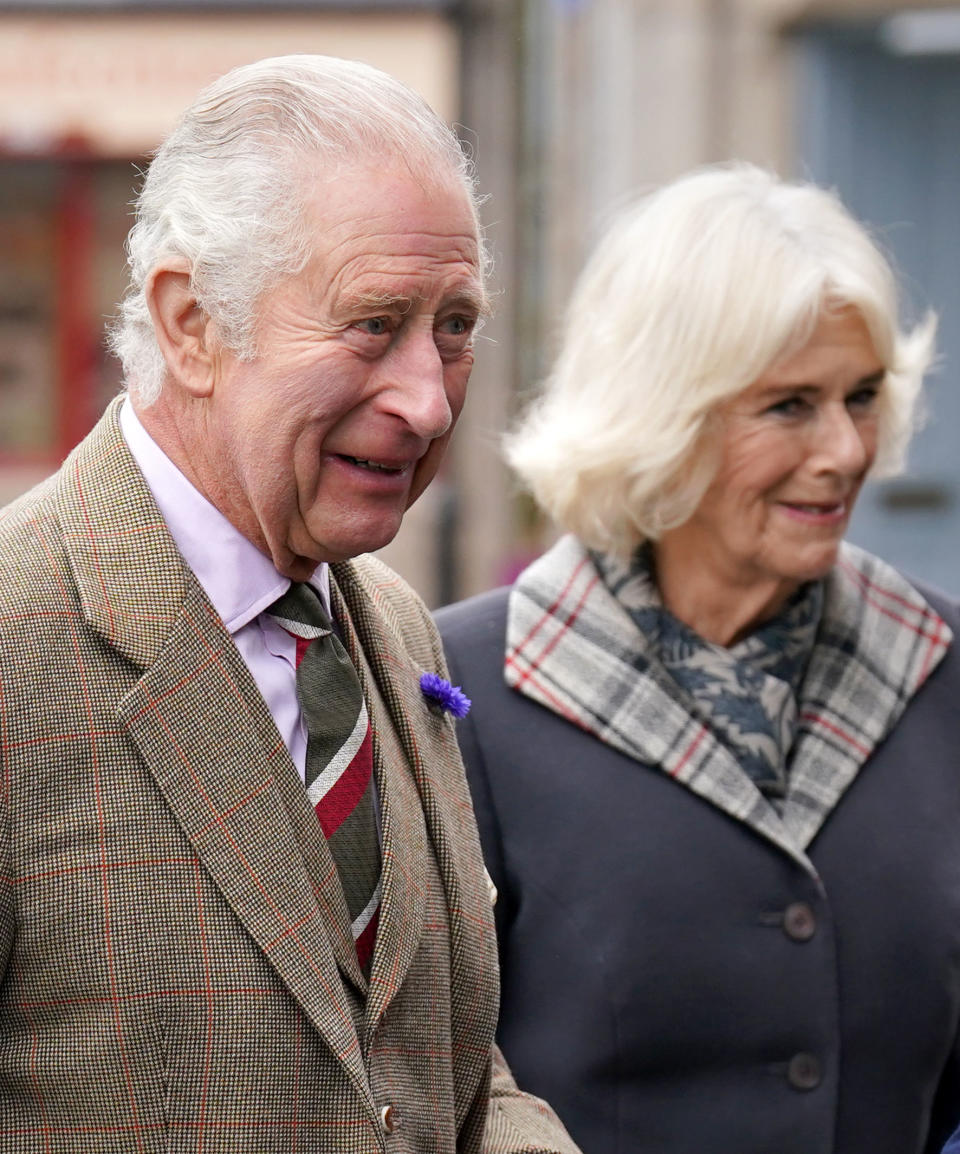 BALLATER, SCOTLAND - OCTOBER 11: King Charles III and the Camilla, Queen Consort  attend a reception to thank the community of Aberdeenshire for their organisation and support following the death of Queen Elizabeth II at Station Square, the Victoria & Albert Halls, on 11th October, 2022 in Ballater, Scotland. (Photo Andrew Milligan - WPA Pool/Getty Images)