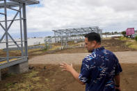 Kuhio Lewis, CEO of the Council for Native Hawaiian Advancement, gives a tour of the Ke Ao Maluhia community at the Maui Lani housing development, Monday, July 8, 2024, in Kahului, Hawaii. A total of 50 two-bedroom modular homes are planned to be built and will be available only to those directly affected by the 2023 wildfires. (AP Photo/Lindsey Wasson)