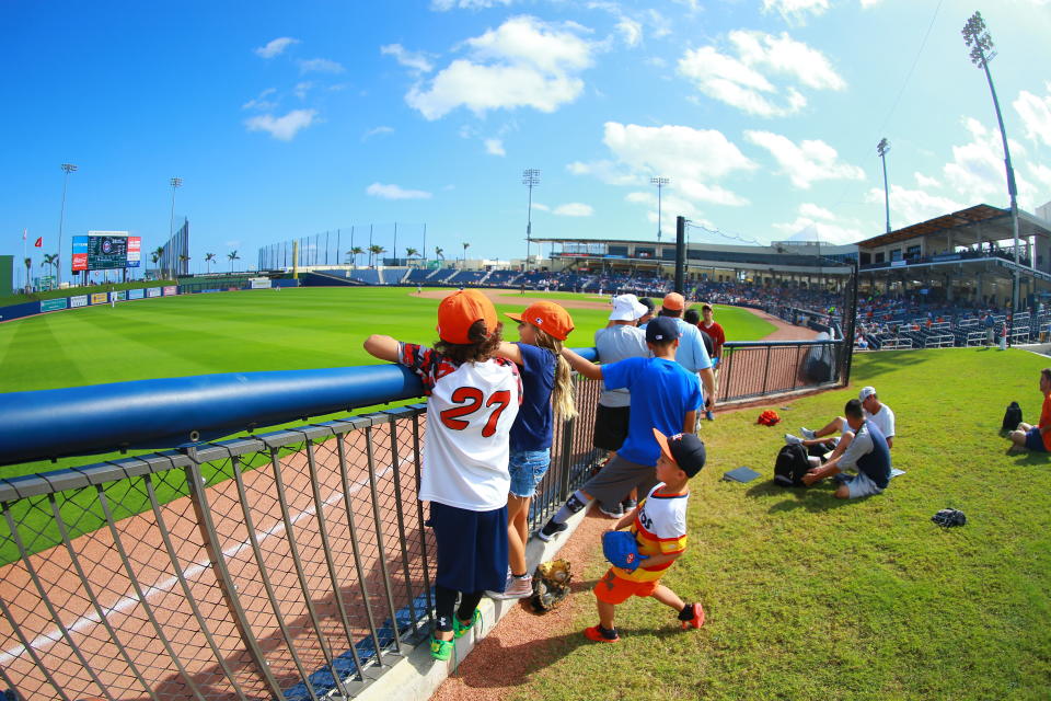 <p>Fans watch the baseball game between the Minnesota Twins and the Houston Astros at the Ballpark of the Palm Beaches in West Palm Beach, Fla. on Feb. 28, 2018. (Photo: Gordon Donovan/Yahoo News) </p>