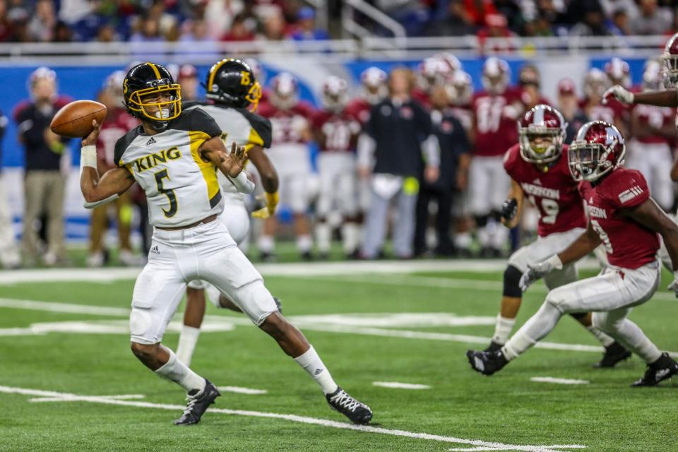 Detroit King's Dequan Finn throws the ball against Muskegon during the Division football state title at Ford Field on Saturday, Nov. 24, 2018.