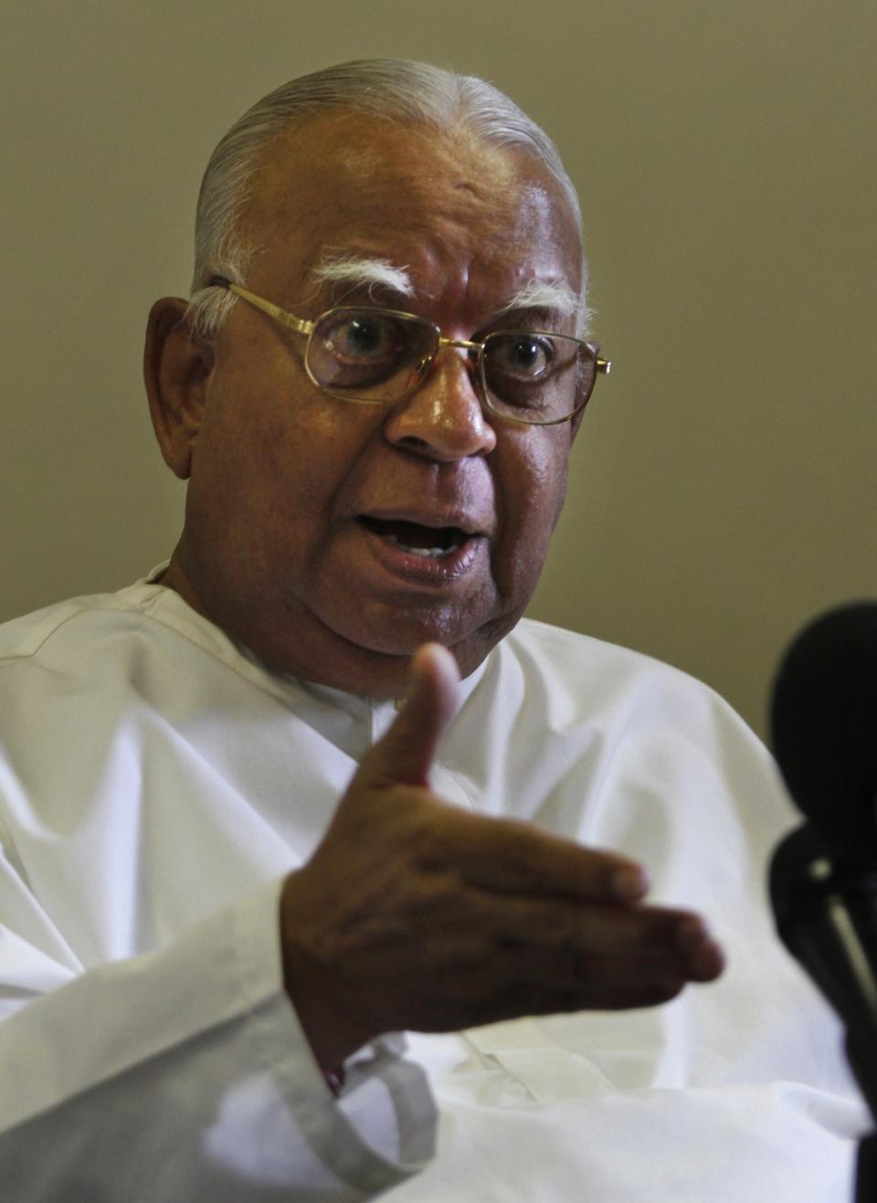 FILE- Sri Lanka's ethnic Tamil minority political party Tamil National Alliance leader Rajavarothiam Sampanthan gestures as he speaks during a media conference in Colombo, Sri Lanka, June 9, 2010. Sampanthan, a senior ethnic Tamil leader and lawmaker, who became the face of the minority community's campaign for autonomy in Sri Lanka since the end of a brutal quarter-century civil war, has died. He was 91.(AP Photo/Eranga Jayawardena, File)