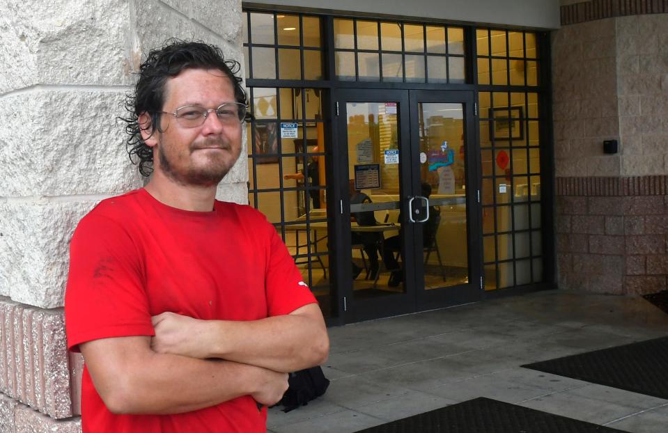 Derick Foyer of Cocoa was the first person to arrive at the Walter Butler Community Center hurricane shelter Wednesday morning in Sharpes.