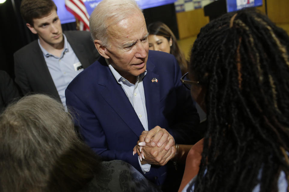 Joe Biden greets an attendee during a campaign event Tuesday in Davenport, Iowa.&nbsp; (Photo: Joshua Lott via Getty Images)