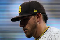 San Diego Padres starting pitcher Joe Musgrove warms up before a baseball game against the Milwaukee Brewers, Monday, April 19, 2021, in San Diego. (AP Photo/Gregory Bull)