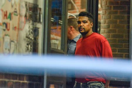 Richard Rojas is escorted from the 7th precinct by New York City Police officers after being processed in connection with the speeding vehicle that struck pedestrians on a sidewalk in Times Square in New York City, U.S., May 18, 2017. REUTERS/Stephanie Keith