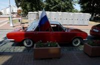 A Russian Volga car is seen decorated with a flag in the centre of Kaliningrad, Russia, June 28, 2018. REUTERS/Kacper Pempel