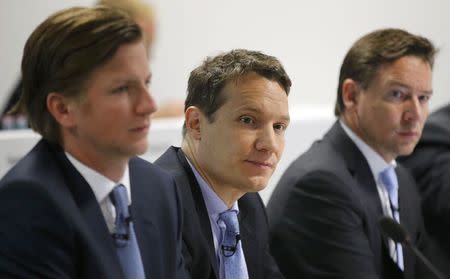 Alexander Kudlich (L-R), member of the management board of Rocket Internet, a German venture capital group, CEO Oliver Samwer and CFO Peter Kimpel attend their shareholder meeting in Berlin, Germany, June 23, 2015. REUTERS/Fabrizio Bensch