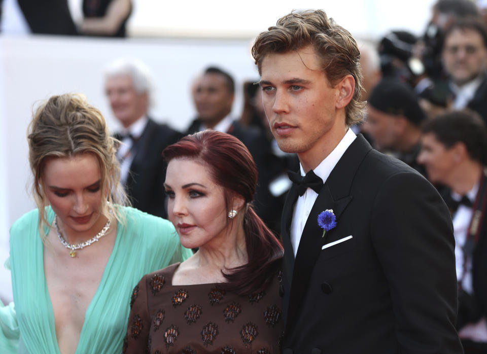 Olivia DeJonge, from left, Priscilla Presley, and Austin Butler pose for photographers upon arrival at the premiere of the film 'Elvis' at the 75th international film festival, Cannes, southern France, Wednesday, May 25, 2022. (Photo by Vianney Le Caer/Invision/AP)