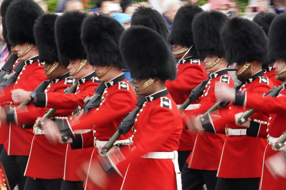 Soldiers of the Irish Guards march along the Mall as they take part in the Trooping the Color ceremony, in London, Saturday, June 15, 2024. Trooping the Color is the King's Birthday Parade and one of the nation's most impressive and iconic annual events attended by almost every member of the Royal Family. (AP Photo/Alberto Pezzali)