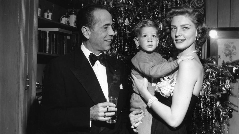 Humphrey Bogart with his wife Lauren Bacall and their son Stephen, circa 1950.