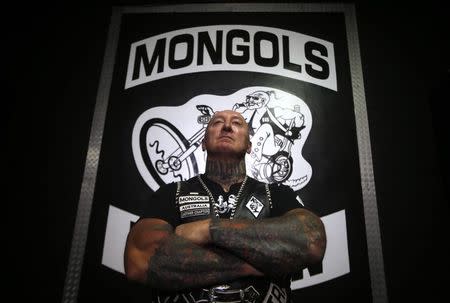 Mark "Ferret" Moroney, national president of the Mongols Motorcycle Club, poses for a photograph in their clubhouse located in western Sydney November 9, 2014. REUTERS/David Gray