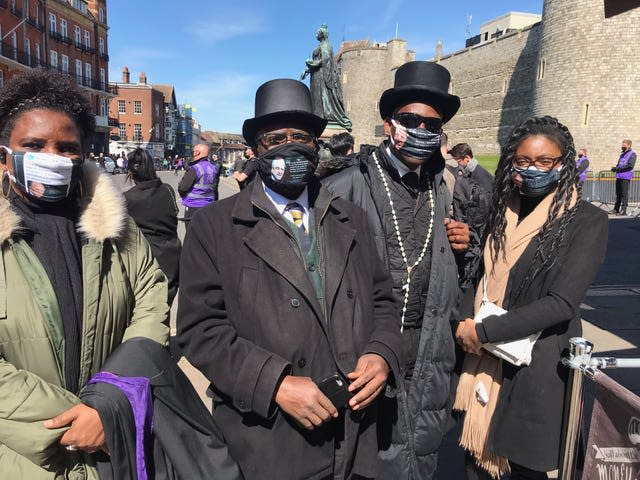 Professor Chris Imafidon (second from left) , outside Windsor Castle, who says he met the duke on a few occasions (Ted Hennessey/PA)