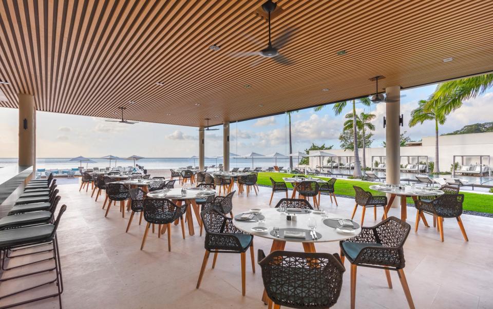 The beachfront Grenadian Grill serves Mediterranean cuisine and authentic Grenadian dishes