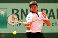 PARIS, FRANCE - MAY 31: Milos Raonic of Canada plays a forehand during his men's singles second round match against Jesse Levine of USA during day five of the French Open at Roland Garros on May 31, 2012 in Paris, France. (Photo by Matthew Stockman/Getty Images)