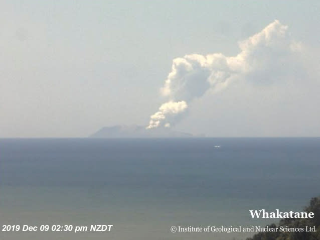 Smoke bellows from Whakaari, also known as White Island, volcano as it erupts in New Zealand