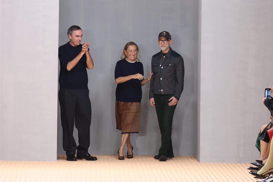 設計師 Miuccia Prada、Raf Simons 與 Fabio Zambernardi。（Getty Images）