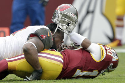 Tampa Bay's Gerald McCoy sacks Washington's Robert Griffin III. (AP)