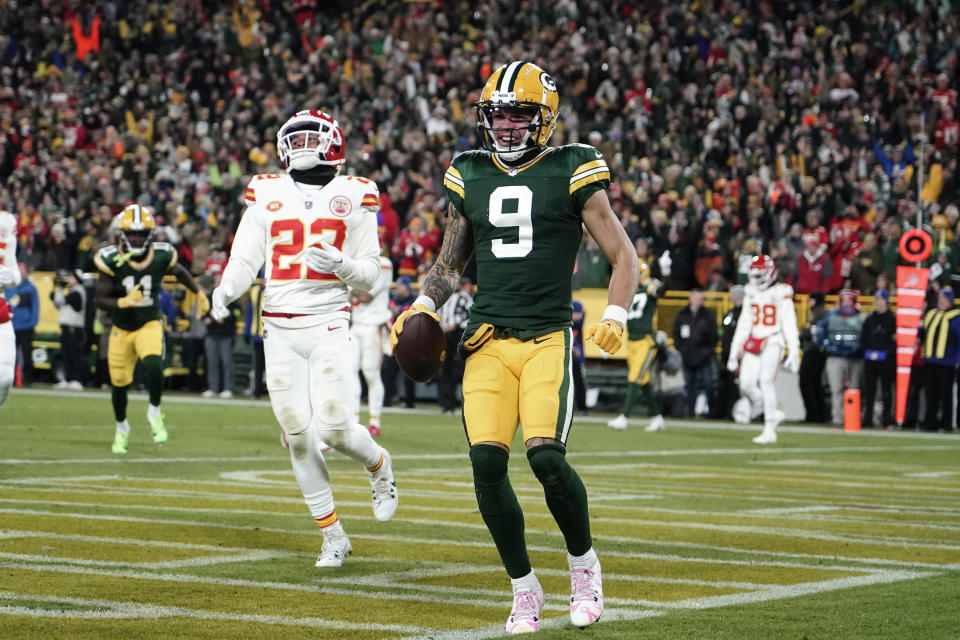 Green Bay Packers wide receiver Christian Watson (9) catches a nine-yard touchdown reception against the Kansas City Chiefs during the first half of an NFL football game Sunday, Dec. 3, 2023 in Green Bay, Wis. (AP Photo/Morry Gash)