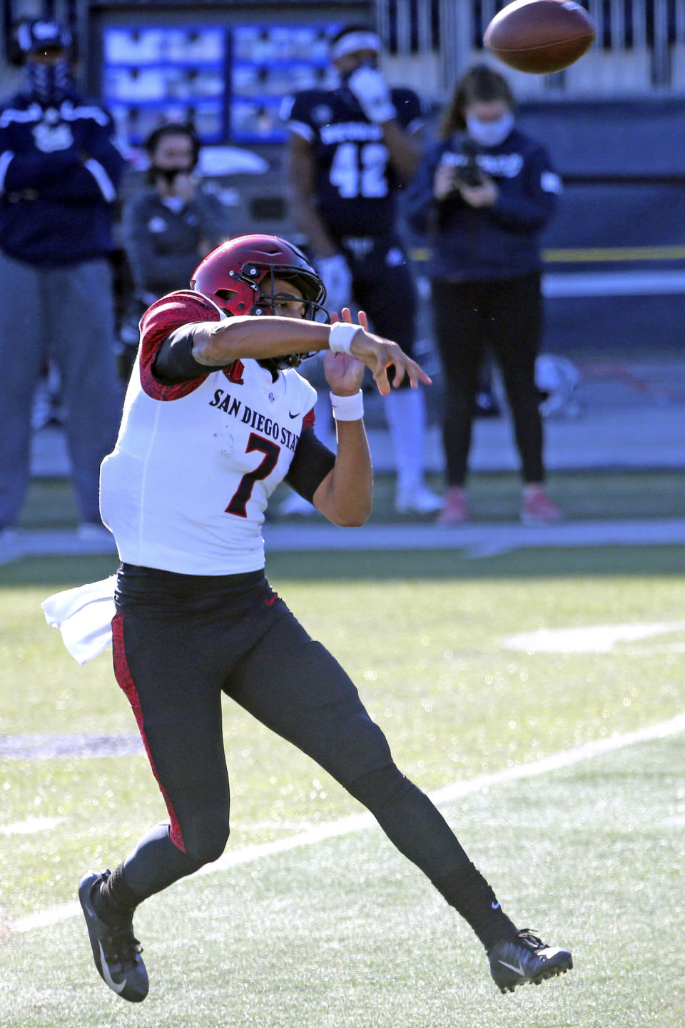 San Diego State quarterback Kaegun Williams throws a first-down pass against Nevada during the first half of an NCAA college football game Saturday, Nov. 21, 2020, in Reno, Nev. (AP Photo/Lance Iversen)