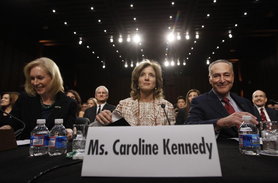 Caroline Kennedy (C), daughter of former U.S. President John F. Kennedy, arrives to testify at a U.S. Senate Foreign Relations Committee hearing on her nomination as the U.S. Ambassador to Japan, on Capitol Hill in Washington, September 19, 2013. Supporting her nomination are U.S. Senator Chuck Schumer (D-NY) (R) and Senator Kirsten Gillibrand (D-NY). REUTERS/Jason Reed (UNITED STATES - Tags: POLITICS)